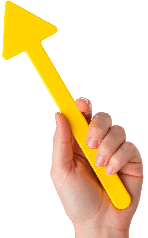 Hand holding a yellow arrow