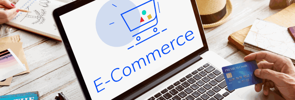 Close-up of a hand holding a card, ready to make an e-commerce purchase