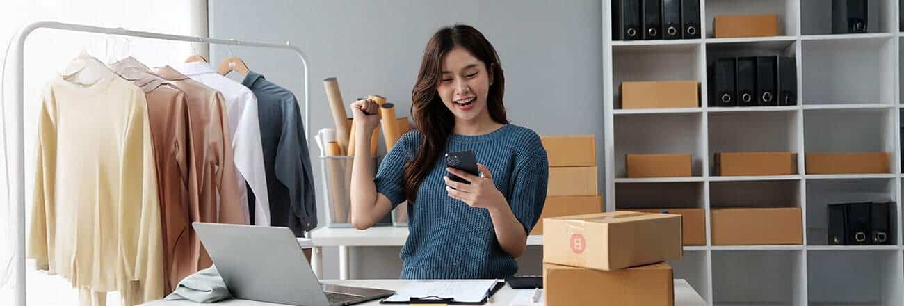 Asian startup business women use laptop checking customer order